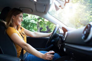 Woman Driving Automobile E1618967930851